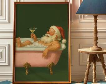 May include: Framed artwork depicting Santa Claus relaxing in a pink bathtub filled with bubbles, holding a martini. He wears a red Santa hat. The background is a dark green, and the tub has gold-colored claw feet.