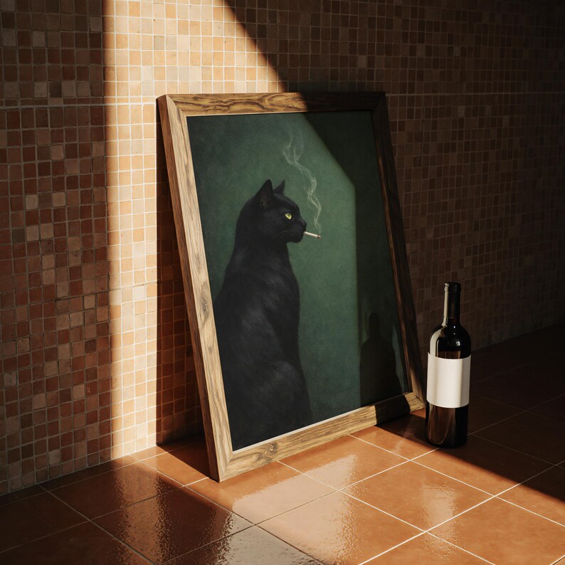 May include: A framed artwork depicts a black cat with yellow eyes smoking a cigarette against a dark green background. A bottle of wine with a blank label rests nearby. The artwork is in a wooden frame.