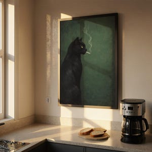 May include: A framed art print depicts a black cat smoking a cigarette against a green backdrop. The cat is in profile, with smoke rising from the cigarette. The print is in a black frame, and the image is displayed in a kitchen setting.