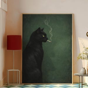 May include: A framed art print featuring a black cat with yellow eyes smoking a cigarette. The cat is set against a dark green background. The artwork is displayed in a room with a red lamp and a patterned floor.