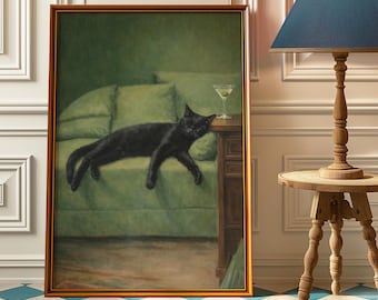 May include: A framed painting shows a black cat reclining on a green sofa, with a martini on a side table. The cat is the main subject, in a relaxed pose. The painting has a vintage style, with a gold frame and a green and brown colour scheme.