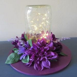 Shades of Purple flower centerpiece - Mason Jar with LED lights and lovely purple flower ring