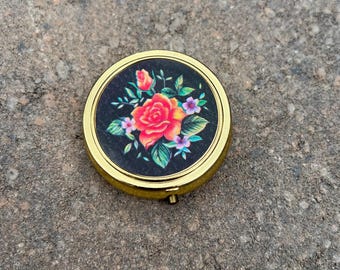 Vintage Gold-Tone Floral Pill Box — Round Brass Compact with Black Rose Enamel Lid, 3-Compartment | Made in Hong Kong