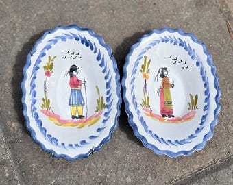 Pair of French Quimper Faience Dishes · Le Potier Peint Main · Hand-Painted Breton Figural Dishes · Blue & White · Oval Scalloped Edge