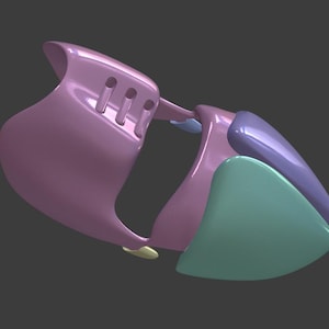 May include: A smooth, moulded plastic protective mask or armour piece featuring a curved lavender base with three vertical slots. It includes a prominent teal triangular plate on the front and a smaller purple accent piece, all with a glossy finish.