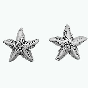 May include: A pair of silver-colored starfish stud earrings. Each earring features a detailed, textured surface, with five points. The earrings are set against a plain white background, highlighting their nautical theme.