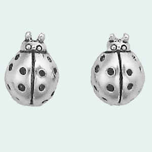 May include: A pair of silver ladybug stud earrings. The ladybugs are detailed with black spots and have a shiny finish.