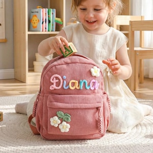 May include: A set of three ceramic mugs with a speckled, matte finish. The mugs are in shades of cream, light gray, and dark gray. Each mug has a simple, minimalist design, perfect for coffee or tea.