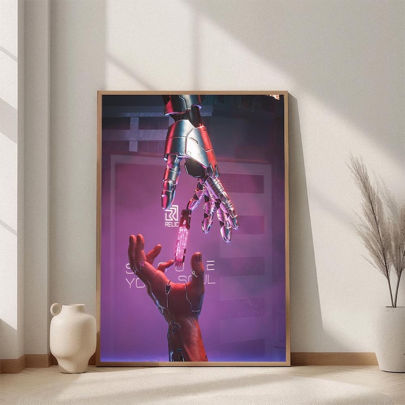 May include: A framed art print featuring a futuristic scene with two hands, one metallic and the other human, reaching for a glowing object. The background is a neon-lit purple with the word "RELIC" visible. The artwork is in a wooden frame.