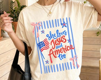 She Loves Jesus And America Too Shirt, 4th Of July Comfort Colors Tee, Patriotic Christian Coquette Bow USA Flag Tee Independence Day Gift