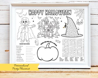 May include: A framed Halloween-themed party placemat with a white border. The black and white design includes a vampire, haunted house, witch's hat maze, and a pumpkin for coloring. Text includes "Happy Halloween".