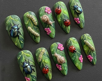 Whimsical Bug Press On Nails: Snails, Caterpillars & Beetles on Leafy Green Background with Pink Flowers