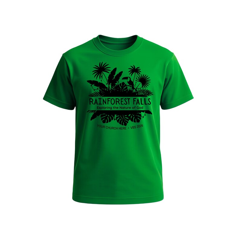 May include: A bright green t-shirt with a black graphic design. The design features the text "RAINFOREST FALLS" above "Exploring the Nature of God" and "YOUR CHURCH HERE &bull; VBS 2026" with palm trees and a toucan.