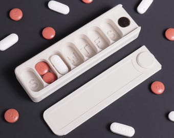 Compacte pillendoos voor 7 dagen, klein weekdoosje, mini reismedicijndoosje, van zondag tot en met zaterdag