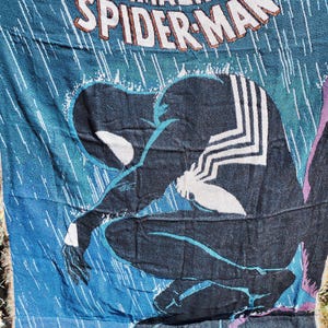 May include: A set of three ceramic nesting bowls in shades of blue, green, and white. The bowls feature a speckled glaze and a simple, modern design. The largest bowl is approximately 8 inches in diameter.