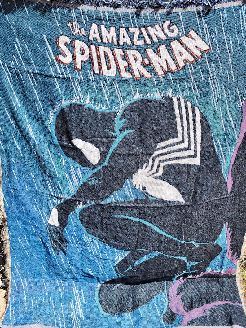 May include: A set of three ceramic nesting bowls in shades of blue, green, and white. The bowls feature a speckled glaze and a simple, modern design. The largest bowl is approximately 8 inches in diameter.