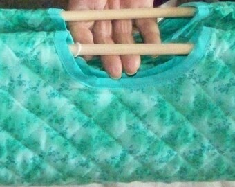 Aqua blue Casserole Carrier good for keeping food cold or hot.