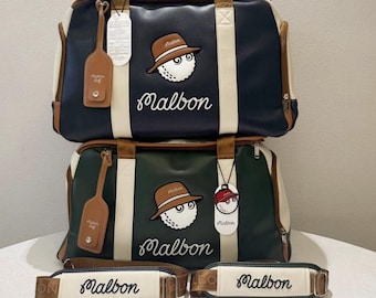 Malbon Golf bag  "Buckets" luxury Duffle Bag – White & Black Leather Travel Weekender, Golf Gift