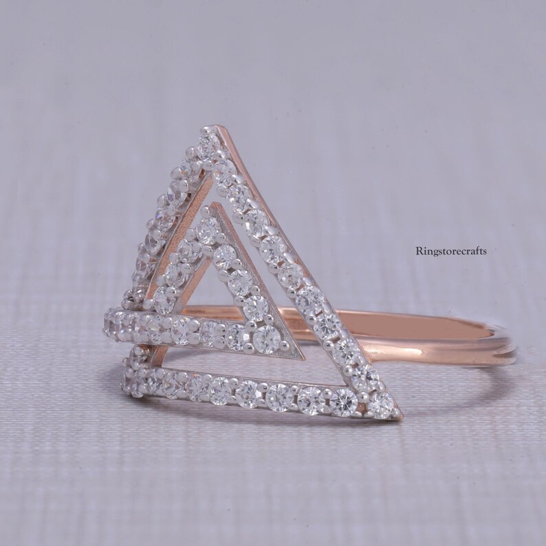 triangle ring
round cut ring
geometric ring
moissanite ring
diamond ring
rose gold ring
modern ring
open triangle ring
minimalist jewelry
dainty ring
statement ring
edgy ring
unique ring
womens ring
bridal jewelry
engagement ring
promise ring
gift for wife
anniversary gift
everyday ring
chic jewelry
trendy ring
fashion ring
custom ring
triangle jewelry
sparkle ring
handmade ring
wedding ring
christmas gift
boho ring
classy ring
christmas sale
proposal ring
birthday gift
latest ring
wedding ring