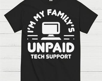 May include: Black t-shirt with a white graphic. The graphic features a computer monitor icon and the text "I'M MY FAMILY'S UNPAID TECH SUPPORT". The shirt is a crew neck style.