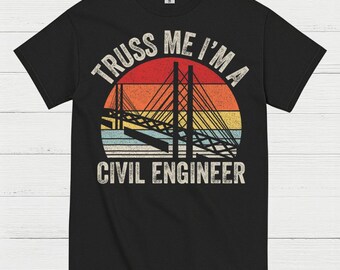 May include: Black t-shirt with a retro design featuring a bridge silhouette against a sunset backdrop. The text reads "TRUSS ME I'M A CIVIL ENGINEER" in a vintage font, suitable for civil engineers.