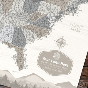 May include: A gray and white map of the United States with a compass and a brown logo that says "Your Logo Here on any of our USA Maps - Where do you call home?"