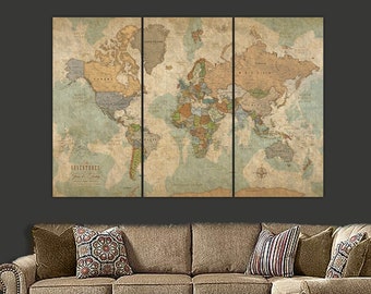 May include: A three-panel world map art print with a vintage aesthetic. The map features a muted color palette of blues, greens, and browns, with country borders and labels. The text "The Adventures Jess & Tony" is visible at the bottom.
