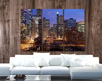 May include: A panoramic view of a city skyline at night. The image is split into three panels, showing a cityscape with tall buildings, bridges, and a river. The buildings are lit up with warm yellow lights, creating a vibrant and lively atmosphere.