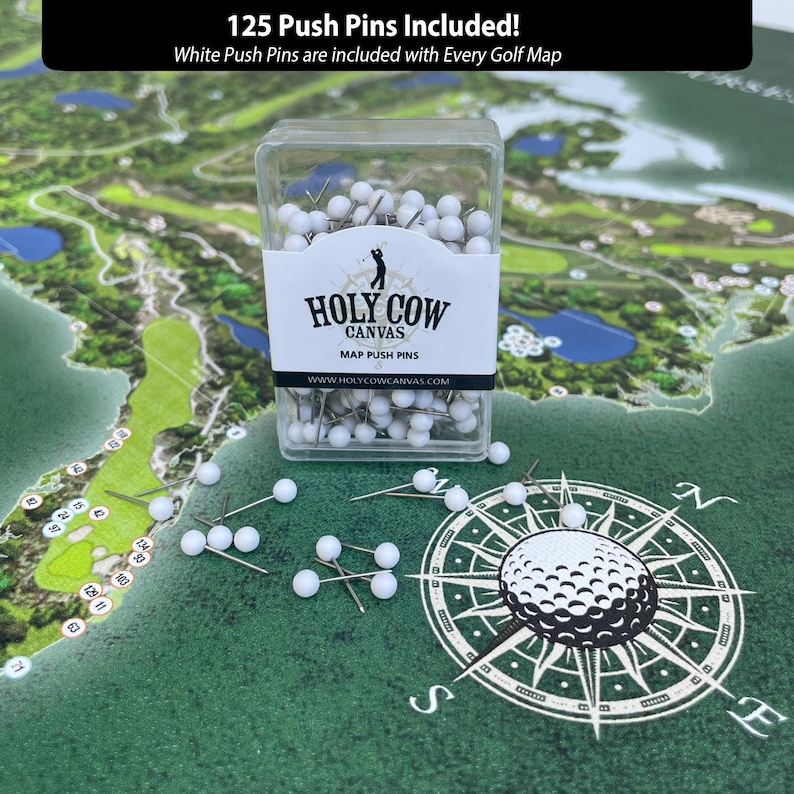 a box of golf balls sitting on top of a map