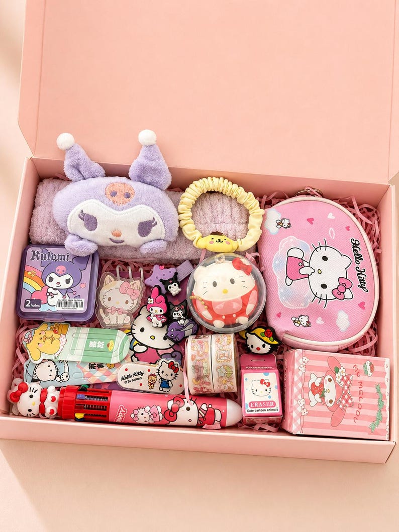 May include: A pink gift box filled with Hello Kitty themed items. Includes a plush Kuromi, a pink pencil case, a multi-color pen, erasers, stickers, hair accessories, and decorative tape. The box is lined with pink paper.