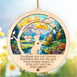 May include: Wooden round ornament with a dog silhouette, tree, and landscape scene. The ornament has a stained glass effect with a heart that says "name" and a paw print that says "year". The text reads "Goodbyes are not forever. Goodbyes are not the end. They simply mean I'll miss you until we meet again!"