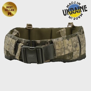 May include: Camouflage tactical belt with a black buckle that reads "DEF". The belt is made in Ukraine and is a best seller. The belt has a padded interior and multiple attachment points.