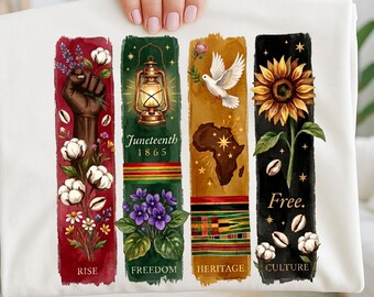 May include: White t-shirt featuring four vertical panels with illustrations and text. The panels include a raised fist, a lantern with "Juneteenth 1865", a dove over an Africa map, and a sunflower. The words "Rise", "Freedom", "Heritage", "Culture", and "Free" are also present.