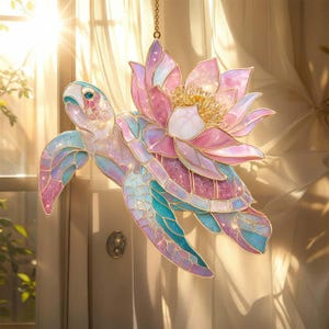 May include: A white ceramic mug with a black handle and the text "But First, Coffee" in a black, handwritten-style font. The mug is on a white surface.