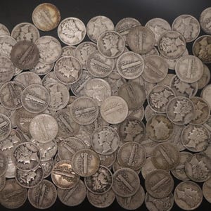 May include: A handmade, wooden cutting board with a natural finish. The board features a live edge on one side and a rectangular shape. It is approximately 18 inches long and 12 inches wide.