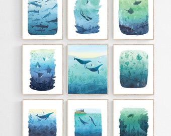May include: Set of nine watercolor illustrations featuring underwater scenes. Each illustration depicts a different marine animal, including sharks, stingrays, and whales, swimming in a blue and green ocean. The illustrations are framed in a white background.