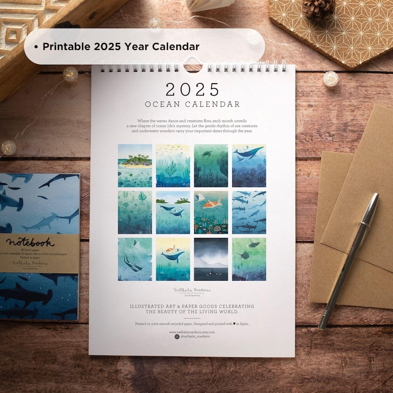 May include: A printable 2025 ocean calendar featuring colorful illustrations of marine life. The calendar is designed and printed in Spain on smooth recycled paper. The text on the calendar reads "2025 Ocean Calendar" and "Illustrated Art & Paper Goods Celebrating the Beauty of the Living World".