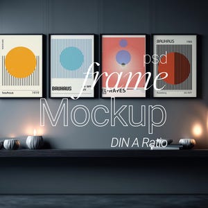 May include: Four framed Bauhaus-style art prints with geometric designs in orange, blue, and red. The prints are displayed on a dark gray wall above a shelf with candles and decorative items. The text "frame Mockup DIN A Ratio" is overlaid.
