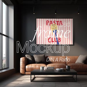 May include: Interior scene featuring a brown leather sofa, black coffee table, and a framed poster with the words "Pasta Frame Club" on a pink and white striped background. The room has a large window and dark walls.