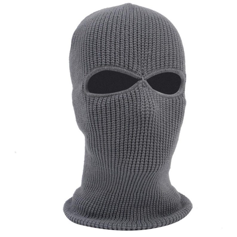 K&ouml;nnte beinhalten: Eine graue Strick-Balaclava mit Augen- und Mund&ouml;ffnungen. Die Kopfbedeckung besteht aus einem dicken, strukturierten Material und ist so konzipiert, dass sie Kopf und Hals bedeckt.