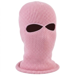 K&ouml;nnte beinhalten: Eine hellrosa Strick-Balaclava mit Augen- und Mund&ouml;ffnungen. Die Skimaske besteht aus einem Rippenstrickstoff. Die &Ouml;ffnungen sind dunkelbraun.
