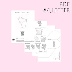May include: A digital sewing pattern for a heart-shaped glasses case in PDF format for A4 and Letter paper. The document includes instructional diagrams, a QR code for a video tutorial, and a printable template with a 5cm by 5cm scale grid.