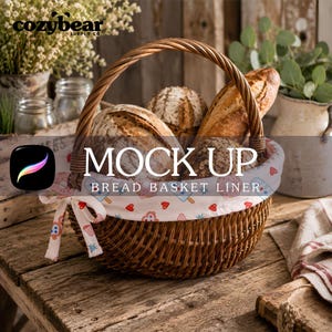 May include: A round brown woven wicker basket with a handle, featuring a white fabric liner decorated with small red hearts and blue star patterns. The basket is filled with several loaves of crusty bread. The text MOCK UP BREAD BASKET LINER is visible.