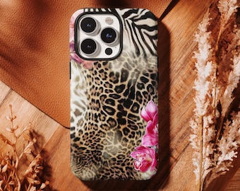 May include: A phone case with a unique animal print design. The case features a combination of leopard spots, zebra stripes, and pink orchid flowers. The case is black around the camera lenses.
