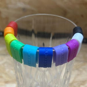Set di 10 pennarelli in vetro nei colori dell'arcobaleno.