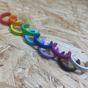 Set van 10 flesmarkers in regenboogkleuren.