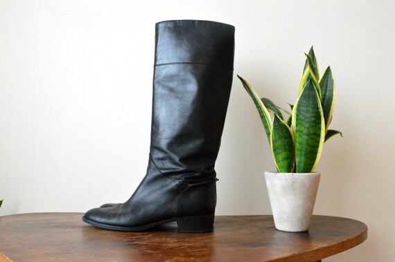 black leather flat boots