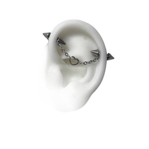 Industrial piercing jewelry with chains and heart , spike ends