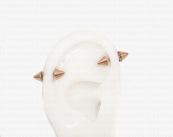 A pair of small barbell, Spike earrings, Arrow shape , cone end balls, in rose gold tone (RG)