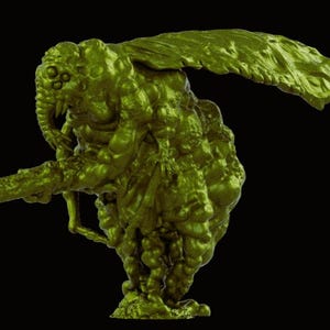 May include: A green, grotesque creature figurine with a textured, bumpy surface. The figure has multiple eyes, a long snout, and a weapon. The creature has large wings and is set against a black background. The figurine is a fantasy or sci-fi themed item.
